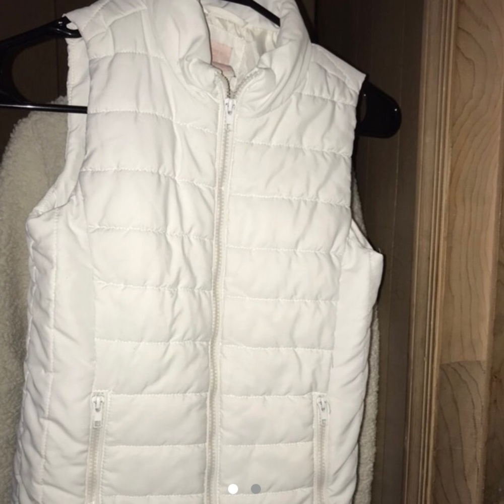 White puffy vest